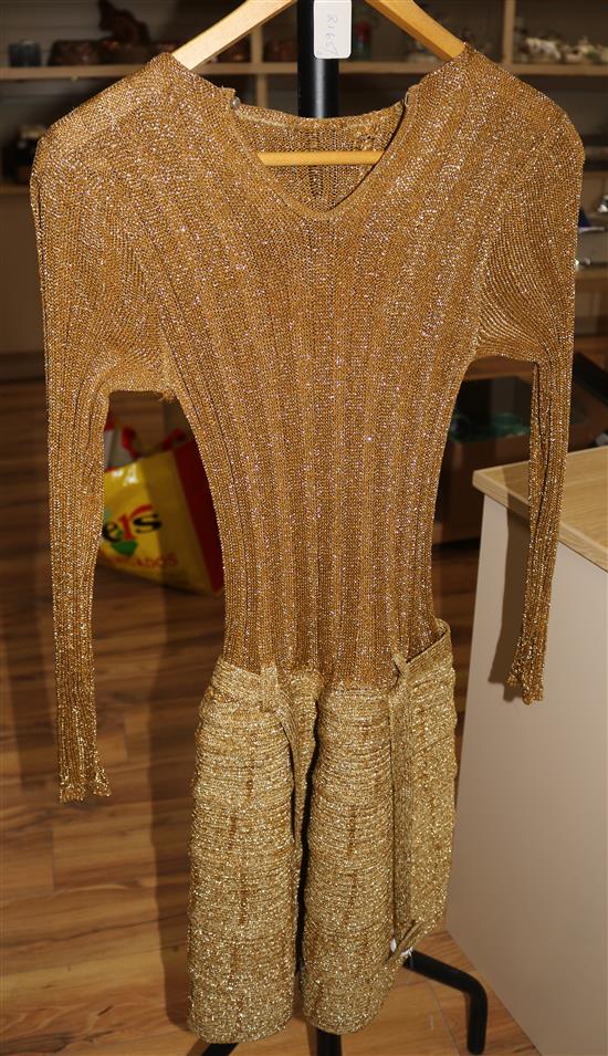 A 1960s hand knitted gold lurex mini dress
